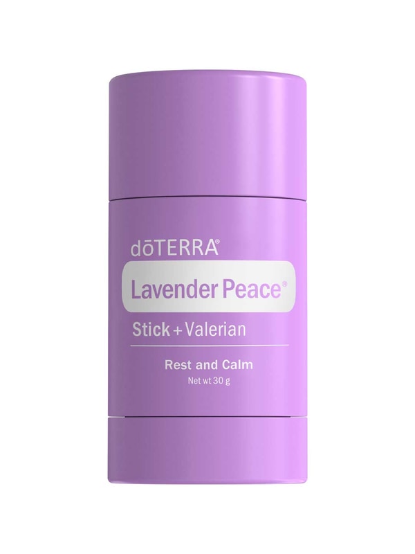 doTERRA Lavender Peace Stick + Valerian in a smooth purple cylindrical tube with a matching cap and a white rounded label panel.