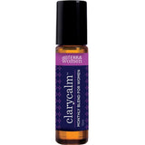 doTERRA ClaryCalm roll-on in a slim amber bottle with a tall black cap and a purple patterned label with white lettering.