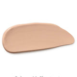 A smooth swipe of Dr Hauschka Concealer 2.5ml with mineral pigments in the medium brown shade 02 Chestnut on a white background.