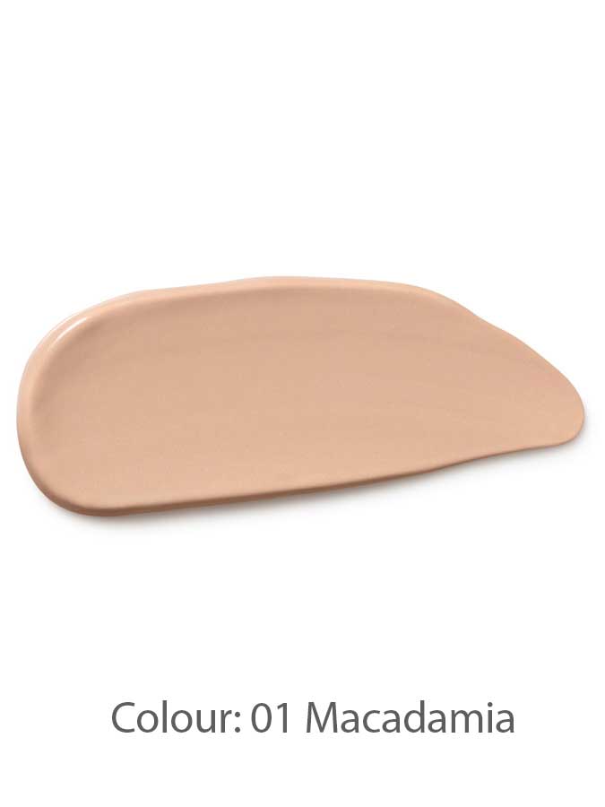 A swatch of creamy beige Dr Hauschka Concealer 2.5ml with mineral pigments, labeled Colour: 01 Macadamia, on a white background.