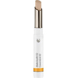 The Dr Hauschka Coverstick 2g is a beige natural concealer in a white tube with a silver twist-up base and yellow accent, ideal for targeted blemish coverage.