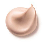 Dr Hauschka Illuminating Fluid 30ml, a shimmery light beige hydrating highlighter with a smooth texture and pointed tip, is displayed against a white background.