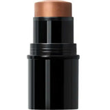 Dr Hauschka Lip to Cheek Tint & Highlighter - Gold 6.1g is a versatile, natural makeup stick in a black tube with creamy gold tint, perfect for use as foundation, contour, or highlighter.