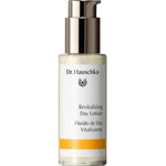 A 50ml bottle of Dr Hauschka Revitalising Day Lotion with a pump dispenser, white label, yellow accent, and English/Spanish descriptions on the packaging.