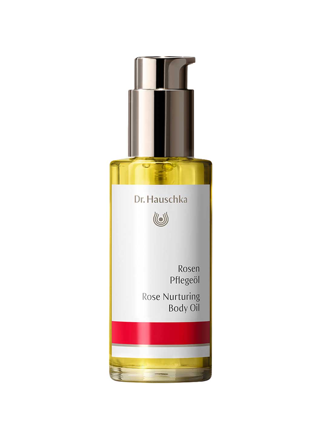 Dr Hauschka Rose Nurturing Body Oil 75ml comes in a clear bottle with a pump dispenser and a white label featuring gold and red accents. This natural, golden-yellow oil is ideal for nourishing sensitive skin.