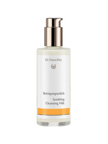 Dr Hauschka Soothing Cleansing Milk 145ml comes in a clear bottle with a gold pump and a white label with orange accents, displaying German and English text; it's a natural cleanser ideal for sensitive skin.