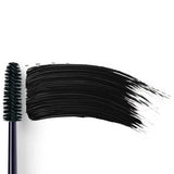 Dr Hauschka Volume Mascara 8ml is displayed with its black bristle wand beside a bold swipe of mascara on a white background, ideal for sensitive eyes.