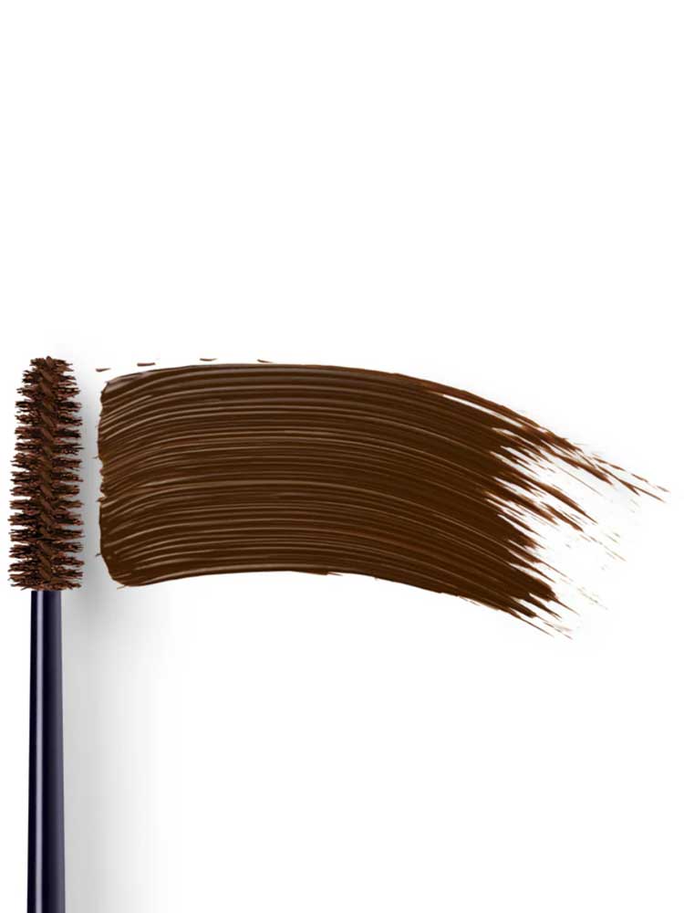 Dr Hauschka Volume Mascara 8ml features a makeup spoolie brush that applies a thick, even swipe of dark brown mascara—ideal for sensitive eyes—shown against a white background.