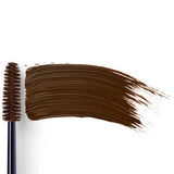 Dr Hauschka Volume Mascara 8ml features a makeup spoolie brush that applies a thick, even swipe of dark brown mascara—ideal for sensitive eyes—shown against a white background.