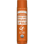A 4g tube of Dr. Bronner's Organic Lip Balms in Orange Ginger flavor, with details and logos such as "USDA Organic" on the label.