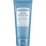 A blue tube of Dr Bronner's Organic Shaving Soap - Baby Unscented (207ml), ideal for sensitive skin, features white and light blue text noting "Certified Fair Trade" and "Smooth & Moisturizing.