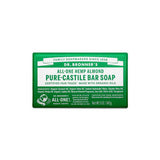 A green and white Dr. Bronner's Pure-Castile Bar Soap Almond 140g, with product details, ingredients, and certifications on the front. This organic soap bar has a net weight of 5 oz (140g).