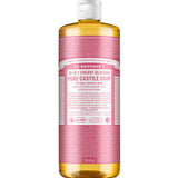 A 945 ml bottle of Dr. Bronner's Pure-Castile Liquid Soap - Cherry Blossom features a pink label, white cap, yellow liquid, and detailed text about its many uses and ingredients on the packaging.