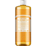 A clear bottle of Dr. Bronner's Pure-Castile Liquid Soap - Citrus with a white cap and orange label displays branding and product info; the golden-yellow, citrus-scented soap inside is suitable for multiple uses.