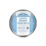 Dr. Bronner's Unscented Organic Magic Balm 57g comes in a round tin with a blue and white label, is USDA organic certified, and is ideal for tattoo care or relieving dry skin on hands, face, and body.