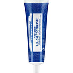 Tube of Dr. Bronner's peppermint all-one toothpaste on a white background
