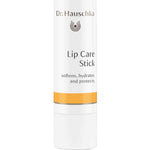 A white tube of Dr Hauschka Lip Care Stick 4.9g with gold accents, labeled to soften, hydrate, and protect lips, stands upright against a plain white background.