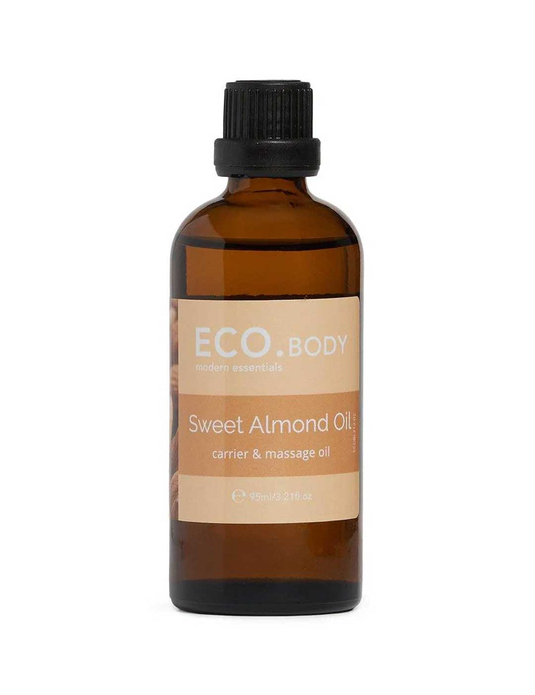 A 95ml brown glass bottle with a black cap, labeled ECO Modern Essentials Sweet Almond Oil, a natural skin moisturizer and carrier oil, is displayed on a white background.