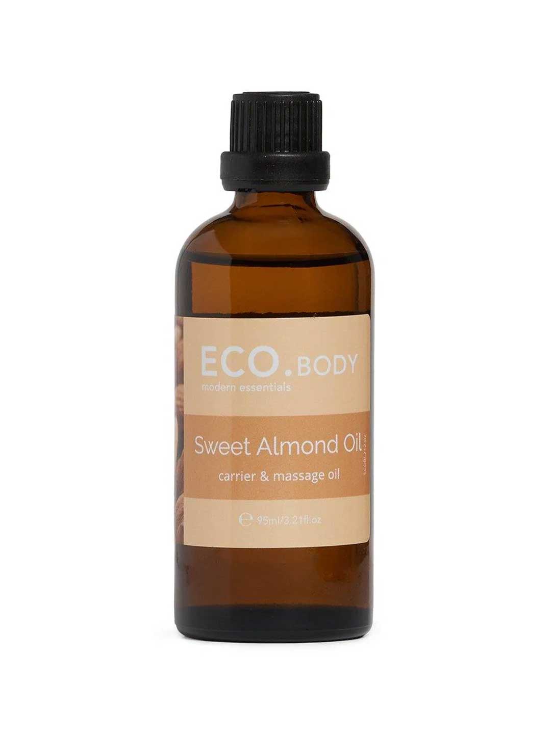 A 95ml brown glass bottle with a black cap, labeled ECO Modern Essentials Sweet Almond Oil, a natural skin moisturizer and carrier oil, is displayed on a white background.