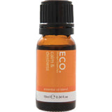 The ECO. Modern Essentials Calm & Destress Essential Oil Blend 10ml comes in a small amber bottle with an orange label and black screw cap, containing grounding oils like Sandalwood.