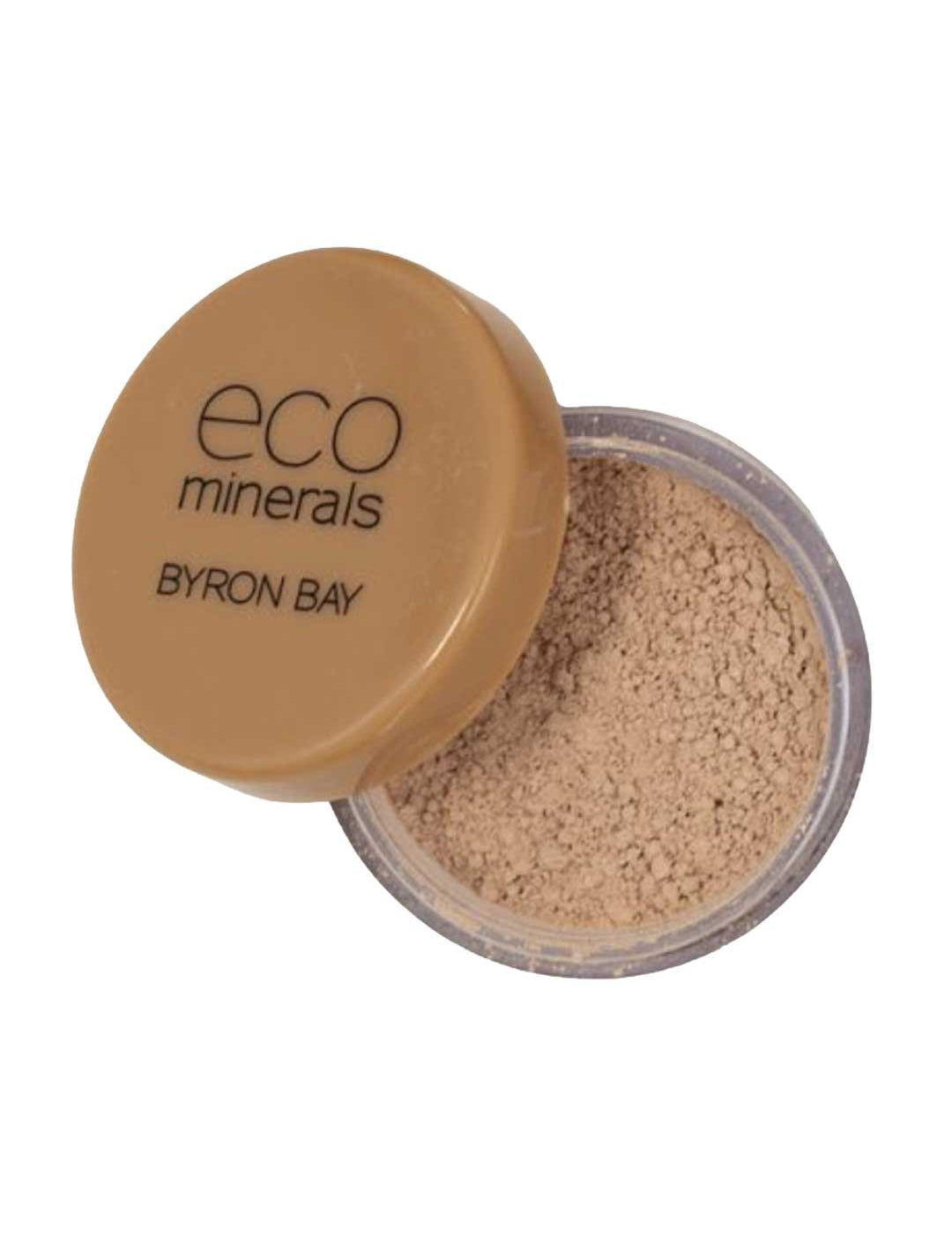 An open container of Eco Minerals Perfection Dewy Mineral Foundation 5g in a small round jar with a tan lid labeled eco minerals BYRON BAY, providing a natural dewy finish.