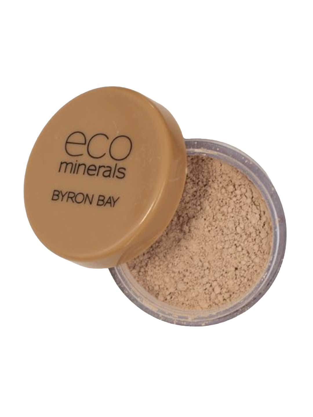 An open container of Eco Minerals Perfection Dewy Mineral Foundation 5g in a small round jar with a tan lid labeled eco minerals BYRON BAY, providing a natural dewy finish.