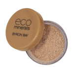 An open container of Eco Minerals Perfection Dewy Mineral Foundation 5g in a small round jar with a tan lid labeled eco minerals BYRON BAY, providing a natural dewy finish.
