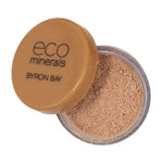 An open container of Eco Minerals Flawless Matte Mineral Foundation 5g in Byron Bay, featuring a tan lid with branding. The light beige loose powder delivers a matte finish and flawless coverage.