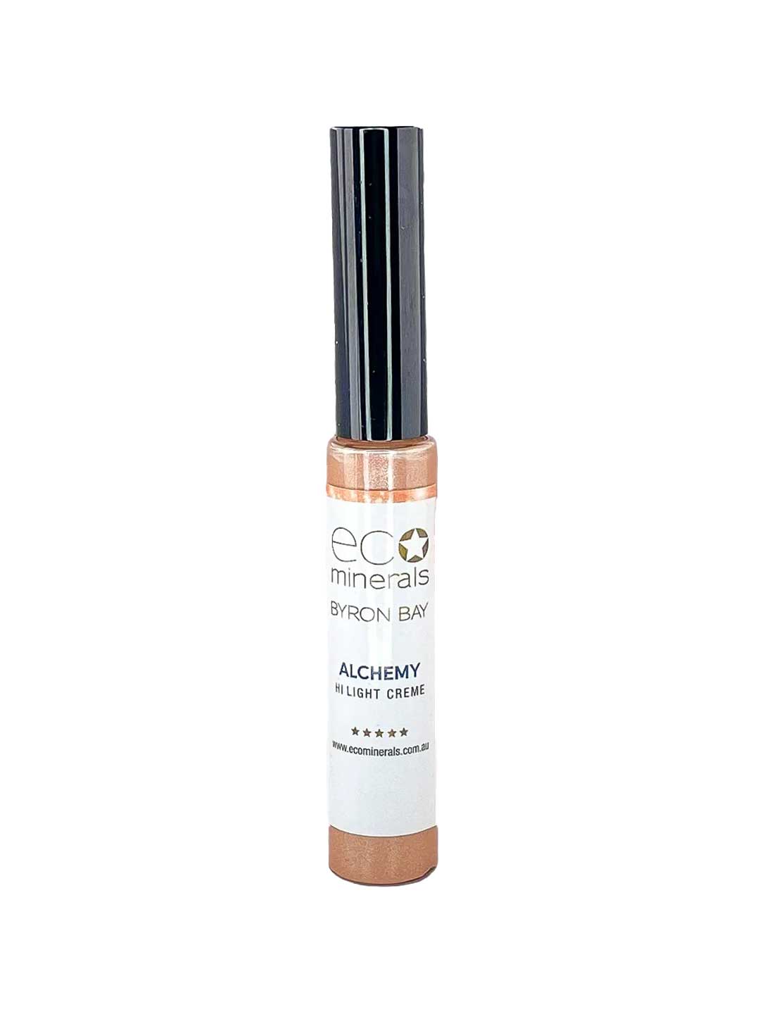 A tube of Eco Minerals Mineral Alchemy High Light Creme 8g with a black cap and white label with gold accents is displayed against a plain white background, offering a luminous glow.