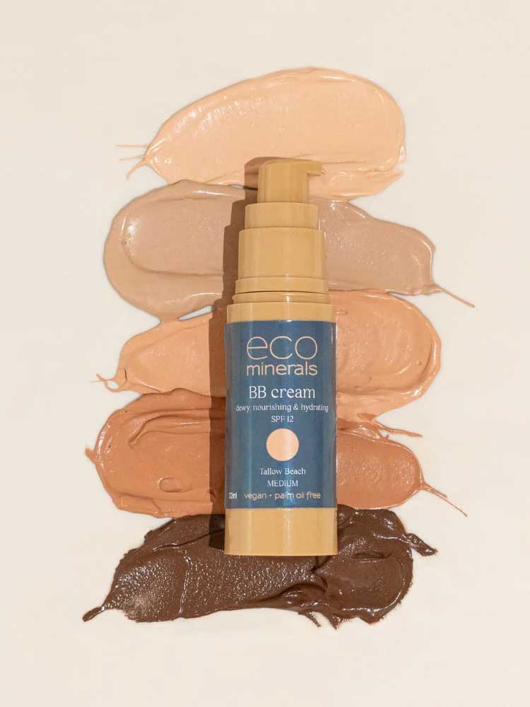 A bottle of Eco Minerals Mineral BB Cream 32ml sits on a light background, surrounded by six skin-tone swatches. The label emphasizes that it is vegan and cruelty-free.