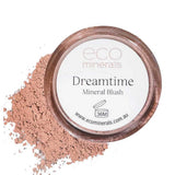 Round container of Eco Minerals Mineral Blush - Dreamtime 4g with loose pink powder spilled beside it on a white background. The label features the product name, website, and promotes eco refills for sustainable beauty.