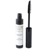 An open tube of Eco Minerals Natural Mascara 8g with its wand applicator resting next to it, showing black bristles and a white label on the tube.