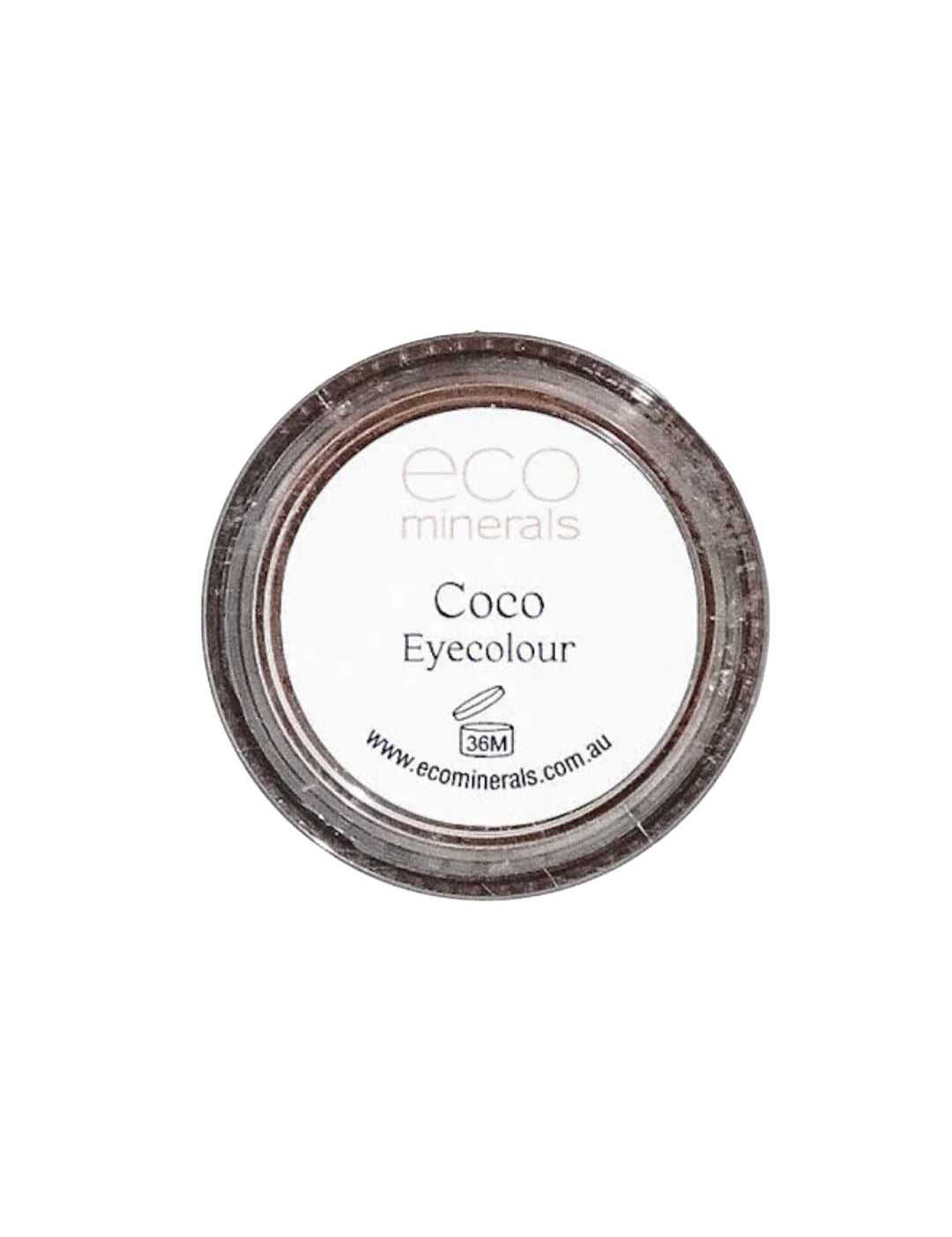 A small round container of Eco Minerals Brow Powder Coco with a clear lid and white label showing the brand, product name, and website—ideal for anyone seeking natural, vegan eyebrow powder.
