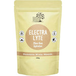 Eden Healthfoods Electra-Lyte Pineapple and Apple in a pale yellow resealable pouch with a tan circular label, white lettering and four small black-and-white symbols.