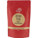 A red stand-up pouch of Edible Herbs Organic Dtox Tea Blend, featuring a beige circular label with black text on a white background.
