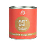 A cylindrical container with a red label reading “Eden Healthfoods Energy Shot Pre-Workout.” This natural energy supplement provides sustained energy and contains 150g of invigorating formula.