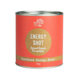 A cylindrical container with a red label reading “Eden Healthfoods Energy Shot Pre-Workout.” This natural energy supplement provides sustained energy and contains 150g of invigorating formula.