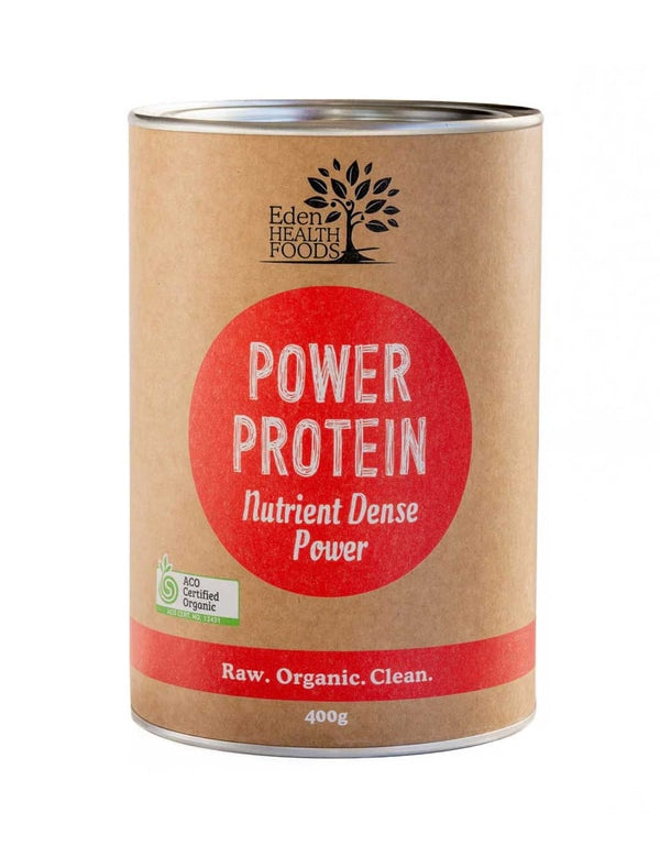 Eden Healthfoods Power Protein 400g comes in a brown can with a large red circle label stating "Power Protein Nutrient Dense Power" and "Raw. Organic. Clean.", highlighting its organic blend of brown rice and hemp protein powder.