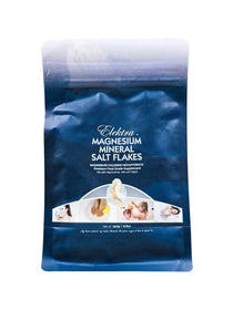 Elektra Magnesium Mineral Salt Flakes in a shiny dark blue resealable pouch with white lettering, a water-drop illustration and a strip of small photographs.