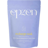 Epzen Magnesium Bath Flakes Recharge Soak 500g comes in a lavender pouch with white and yellow text, featuring a minimalist design. The soak contains 100% natural magnesium bath flakes and essential oils for relaxation.