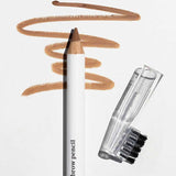 The Ere Perez Almond Brow Pencil 1.1g, a vegan brow pencil with a clear cap and attached brush, rests on a white surface; light brown strokes above display its natural effect. The label reads Ere Perez Almond Brow Pencil 1.1g.
