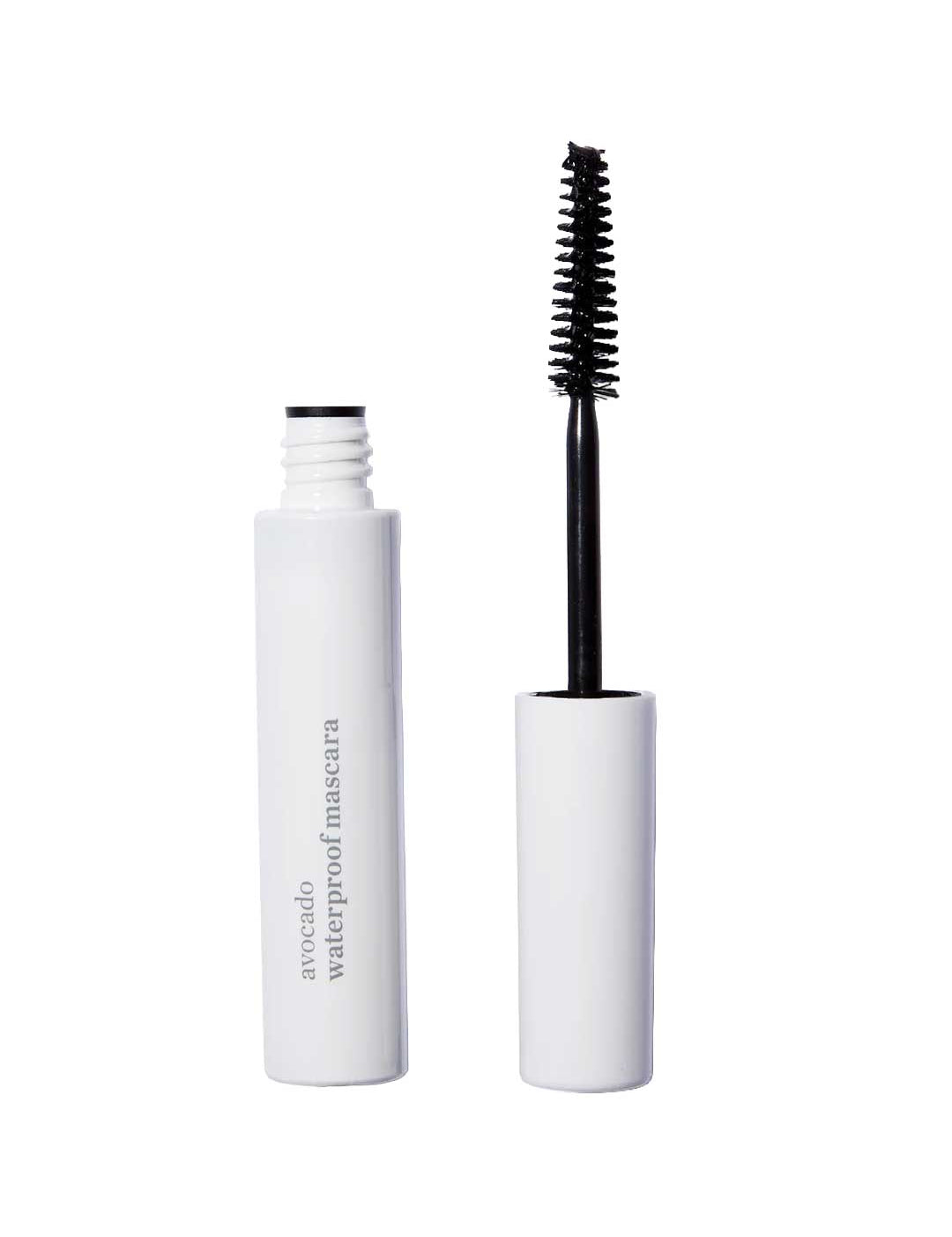 A white tube of Ere Perez Avocado Waterproof Mascara 10ml stands upright with its vegan wand and brush applicator removed; the tube displays “avocado waterproof mascara.”.