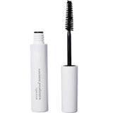 A white tube of Ere Perez Avocado Waterproof Mascara 10ml stands upright with its vegan wand and brush applicator removed; the tube displays “avocado waterproof mascara.”.