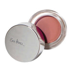The Ere Perez Carrot Colour Pot 6.5g features a round container with a silver lid branded "Ere Perez," revealing a mauve-pink cream blush enriched with carrot oil for a natural look.