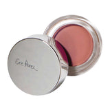 The Ere Perez Carrot Colour Pot 6.5g features a round container with a silver lid branded "Ere Perez," revealing a mauve-pink cream blush enriched with carrot oil for a natural look.