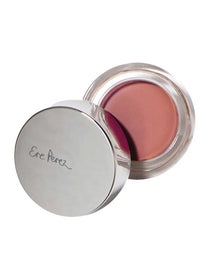 The Ere Perez Carrot Colour Pot 6.5g features a round container with a silver lid branded "Ere Perez," revealing a mauve-pink cream blush enriched with carrot oil for a natural look.