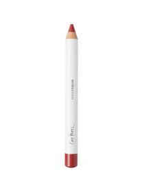 A white, wooden-tipped crayon labeled "Ere Perez Coco Lip & Cheek Crayons 3g" in red stands upright on a white background—this hydrating crayon offers bold, nourishing color for lips and cheeks.