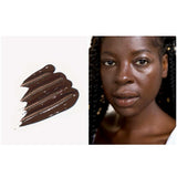 Swatch of deep brown Ere Perez Oat Milk Foundation 30ml on the left and a woman with deep skin tone wearing the natural liquid foundation on the right. Text below reads: shade espresso | deep neutral.