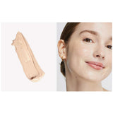A swatch of Ere Perez Oat Milk Foundation 30ml in light beige sits beside a close-up of a smiling person with fair, neutral skin and a smooth complexion. Text: shade nougat | fairest neutral | medium coverage.