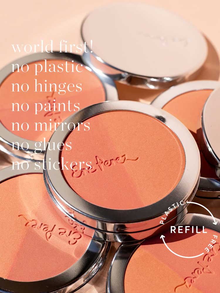 A close-up of Ere Perez Rice Powder Blush - Bondi Refill 9g compacts with a pink-orange shade and silver edges, showcasing the vegan, refillable design—free from plastic, hinges, paints, mirrors, glue, or stickers.